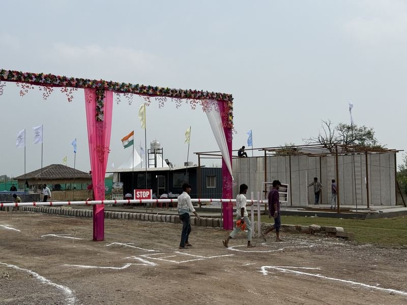 Vantara Heritage Garhmukteshwar – Pink Floral Entrance Gate at Project Site